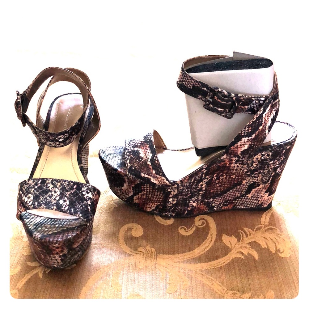 BCBG. Faux snake skin platforms.